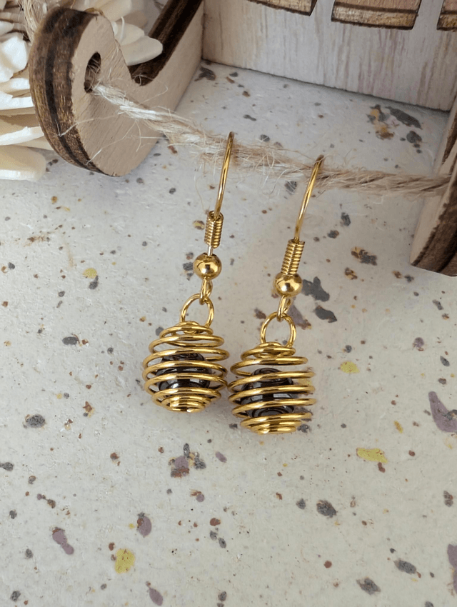 Boucles d'oreilles cage dorée 
