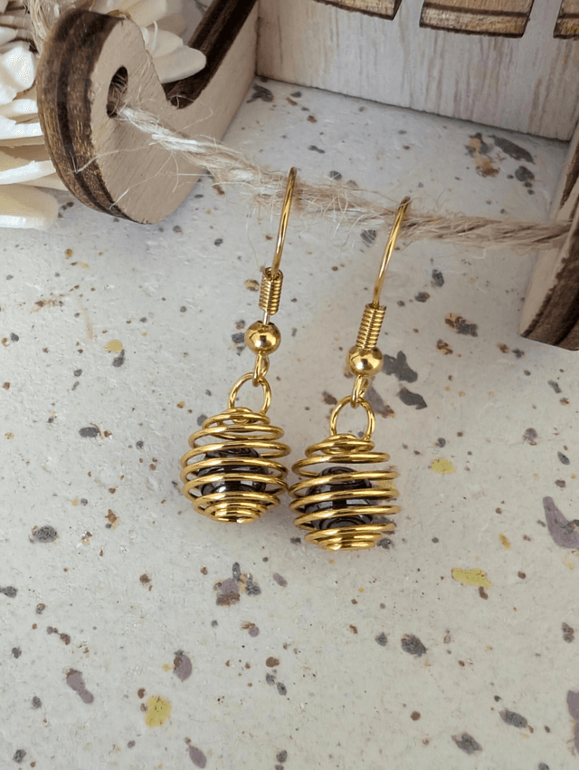 Boucles d&#039;oreilles cage dorée 